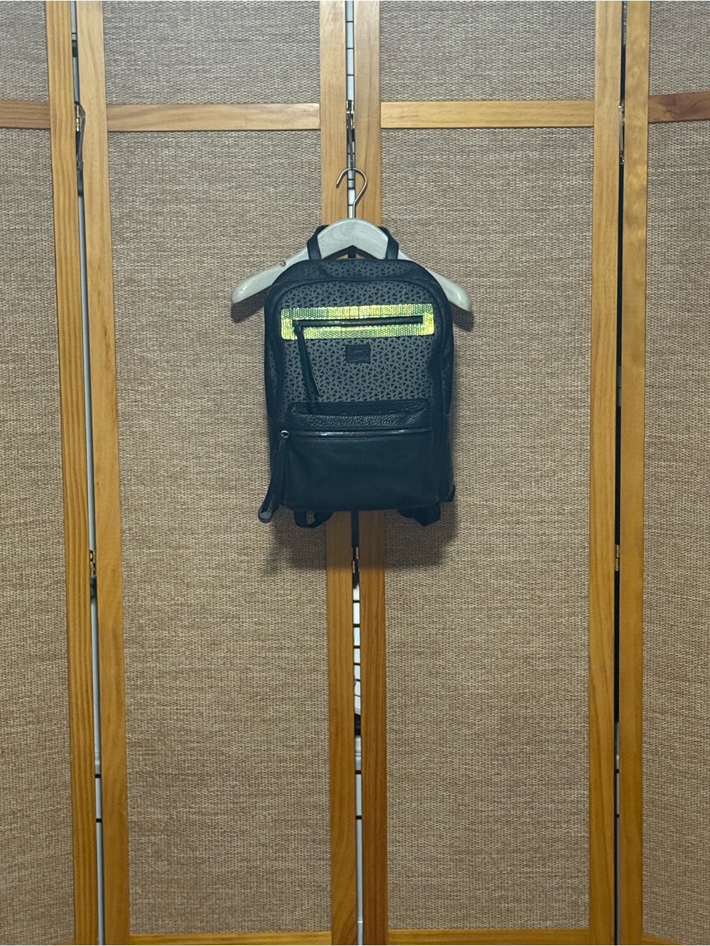 Louboutin Iridescent Embossed Black Backpack with Reflective Green Accent